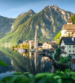 Picturesque view of Hallstatt village, lake, and mountain landscape in Austria.